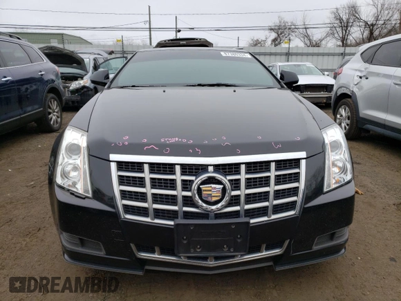 2013 Cadillac CTS z VIN 1G6DA1E31D0154605, wystawiony jako Copart lot #87380334 z przebiegiem 129 114 mil mil oraz Szkoda całkowita • Salvage title. Historia ofert i sprzedaży dostępna na DreamBid. Obrazek 5.