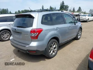 2015 Subaru Forester Touring with VIN JF2SJAWC6FH546472, listed as a IAAI auction lot 42513843 with 107,951 mi miles and . Bid and sale history available at DreamBid. Image 4.