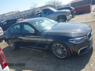 2019 BMW 5 Series M550i xDrive with VIN WBAJB9C51KB464879, listed as a IAAI auction lot 41774834 with 77,379 mi miles and . Bid and sale history available at DreamBid. Image 13.