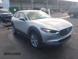 2021 Mazda CX-30 Select with VIN 3MVDMABL8MM231295, listed as a IAAI auction lot 41526990 with 133,144 mi miles. Bid and sale history available at carsss.com. Image 1.