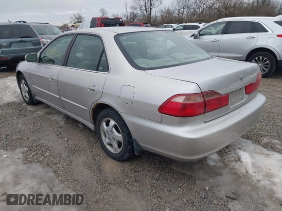 1998 Honda Accord EX z VIN 1HGCG5556WA207104, wystawiony jako IAAI lot #41444523 z przebiegiem 284 755 mil mil oraz . Historia ofert i sprzedaży dostępna na DreamBid. Obrazek 3.