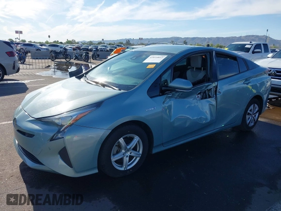 2018 Toyota Prius Two with VIN JTDKBRFUXJ3066430, listed as a IAAI auction lot 42034812 with 119,711 mi miles and . Bid and sale history available at carsss.com. Image 6.
