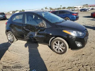 2012 Mazda Mazda2 Touring with VIN JM1DE1LZ7C0140201, listed as a Copart auction lot 88479755 with 139,526 mi miles and Salvage Title. Bid and sale history available at carsss.com. Image 4.