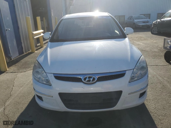 2010 Hyundai Elantra Touring GLS with VIN KMHDB8AE8AU085549, listed as a Copart auction lot 77871304 with 158,558 mi miles and Salvage Title. Bid and sale history available at carsss.com. Image 5.