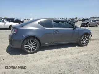 2015 Scion tC z VIN JTKJF5C76FJ010813, wystawiony jako Copart lot #58987575 z przebiegiem 108 709 mil mil oraz Szkoda całkowita • Salvage title. Historia ofert i sprzedaży dostępna na DreamBid. Obrazek 3.