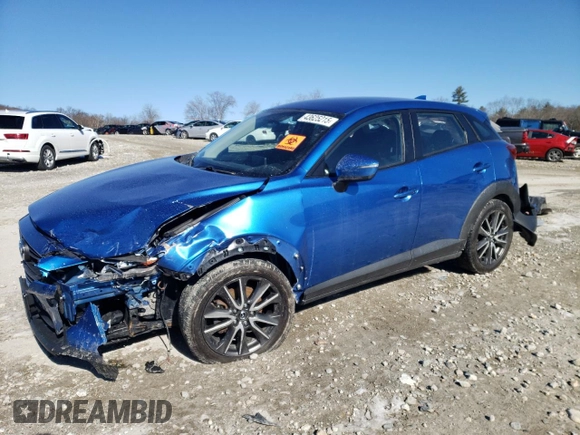 2017 Mazda CX-3 Touring with VIN JM1DKFC71H0149617, listed as a Copart auction lot 43625215 with 71,828 mi miles and Salvage Title. Bid and sale history available at DreamBid. Image 1.