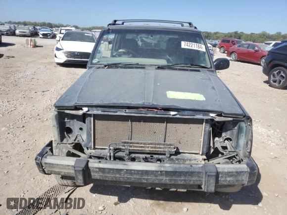 1995 Jeep Cherokee with VIN 1J4FN78S5SL557086, listed as a Copart auction lot 74221184 with 416,415 mi miles and Salvage title. Bid and sale history available at DreamBid. Image 5.