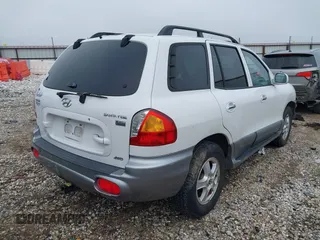 2003 Hyundai Santa Fe LX with VIN KM8SC73E23U536604, listed as a IAAI auction lot 41244086 with 193,213 mi miles. Bid and sale history available at carsss.com. Image 4.