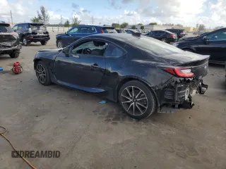 2023 Toyota GR86 with VIN JF1ZNBC19P8763094, listed as a Copart auction lot 42572105 with 13,271 mi miles and Salvage Title. Bid and sale history available at carsss.com. Image 2.