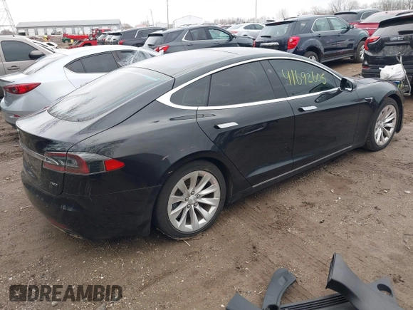 2017 Tesla Model S 100D with VIN 5YJSA1E25HF215778, listed as a IAAI auction lot 41692605 with Not Provided miles and . Bid and sale history available at DreamBid. Image 4.