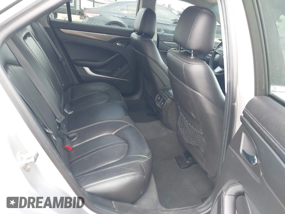 2013 Cadillac CTS Luxury with VIN 1G6DH5E58D0102036, listed as a IAAI auction lot 42270393 with 133,203 mi miles and . Bid and sale history available at DreamBid. Image 8.
