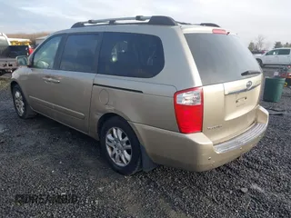 2007 Kia Sedona EX with VIN KNDMB233676121720, listed as a IAAI auction lot 41606082 with 200,736 mi miles. Bid and sale history available at carsss.com. Image 3.
