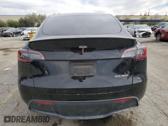 2022 Tesla Model Y Performance with VIN 7SAYGDEF1NF407985, listed as a Copart auction lot 53831325 with 41,225 mi miles and Salvage title. Bid and sale history available at DreamBid. Image 6.