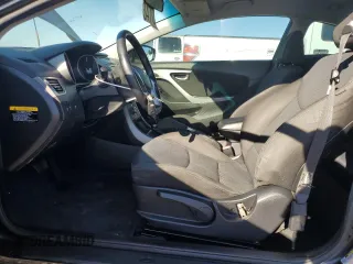 2014 Hyundai Elantra Coupe with VIN KMHDH6AH2EU029402, listed as a Copart auction lot 73036614 with 106,749 mi miles and Salvage Title. Bid and sale history available at carsss.com. Image 7.