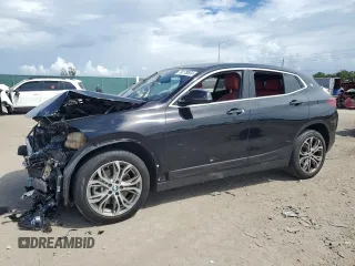 2022 BMW X2 sDrive28i with VIN WBXYH9C0XN5T86256, listed as a Copart auction lot 74173554 with 35,658 mi miles and Salvage Title. Bid and sale history available at carsss.com. Image 1.