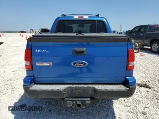 2010 Ford Explorer Sport Trac XLT z VIN 1FMEU3BE4AUF04190, wystawiony jako Copart lot #51857205 z przebiegiem 91 112 mil mil oraz Szkody całkowita. Historia ofert i sprzedaży dostępna na DreamBid. Obrazek 6.