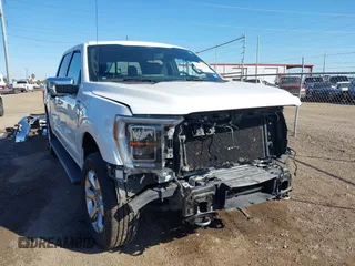 2021 Ford F-150 XL with VIN 1FTFW1E81MFA85592, listed as a IAAI auction lot 41414090 with 40,738 mi miles. Bid and sale history available at carsss.com. Image 1.