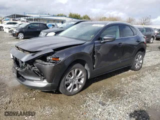 2021 Mazda CX-30 Premium with VIN 3MVDMBDM2MM233751, listed as a Copart auction lot 45361605 with 66,387 mi miles and Salvage Title. Bid and sale history available at carsss.com. Image 1.