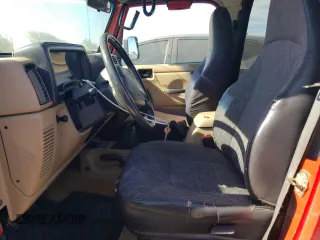 2000 Jeep Wrangler Sport with VIN 1J4FA49S1YP703560, listed as a Copart auction lot 73647844 with 117,300 mi miles and Salvage Title. Bid and sale history available at carsss.com. Image 7.