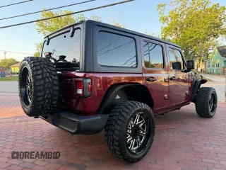 2021 Jeep Wrangler Unlimited Willys with VIN 1C4HJXDNXMW680247, listed as a Copart auction lot 57000145 with 77,407 mi miles and Clean Title. Bid and sale history available at DreamBid. Image 4.