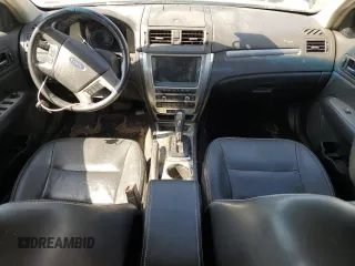 2012 Ford Fusion Hybrid with VIN 3FADP0L33CR258753, listed as a Copart auction lot 74201724 with 158,434 mi miles and Salvage title. Bid and sale history available at DreamBid. Image 8.