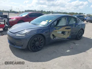 2022 Tesla Model 3 Performance with VIN 5YJ3E1EC9NF201184, listed as a IAAI auction lot 41534959 with 29,389 mi miles and . Bid and sale history available at DreamBid. Image 18.