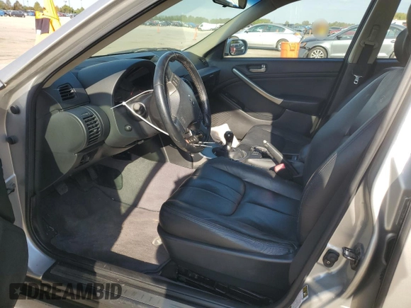 2004 Infiniti G35 w/Leather with VIN JNKCV51E24M111782, listed as a Copart auction lot 74676044 with 121,564 mi miles and Salvage Title. Bid and sale history available at DreamBid. Image 7.