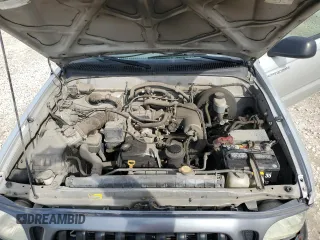 2004 Toyota Tacoma z VIN 5TENL42N34Z452222, wystawiony jako Copart lot #52334205 z przebiegiem 122 503 mil mil oraz Szkoda całkowita • Salvage title. Historia ofert i sprzedaży dostępna na DreamBid. Obrazek 12.