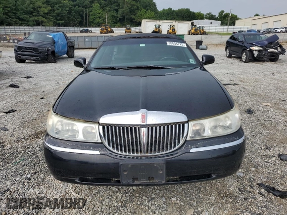 2000 Lincoln Town Car Executive с VIN 1L1FM81W8YY771526, выставлен на аукционе Copart как лот 65654725 с пробегом 51 048 миль миль и Чистый • Clean title. История ставок и продаж доступна на DreamBid. Изображение 5.