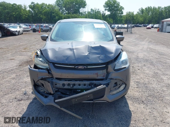 2014 Ford Escape SE with VIN 1FMCU9GXXEUE08655, listed as a IAAI auction lot 42469634 with 163,054 mi miles and . Bid and sale history available at DreamBid. Image 12.
