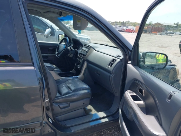 2006 Honda Pilot EX-L with VIN 2HKYF18576H506735, listed as a IAAI auction lot 41876692 with 182,341 mi miles. Bid and sale history available at carsss.com. Image 5.