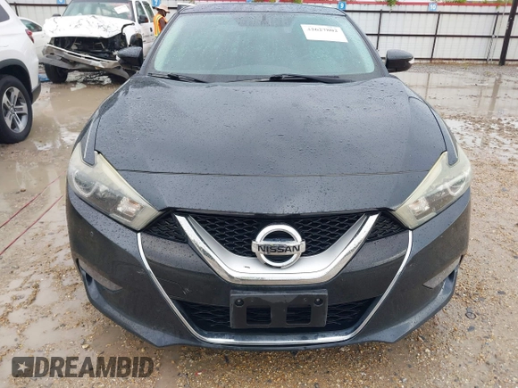 2016 Nissan Maxima SV with VIN 1N4AA6AP8GC426999, listed as a IAAI auction lot 42627802 with 160,643 mi miles and . Bid and sale history available at DreamBid. Image 13.