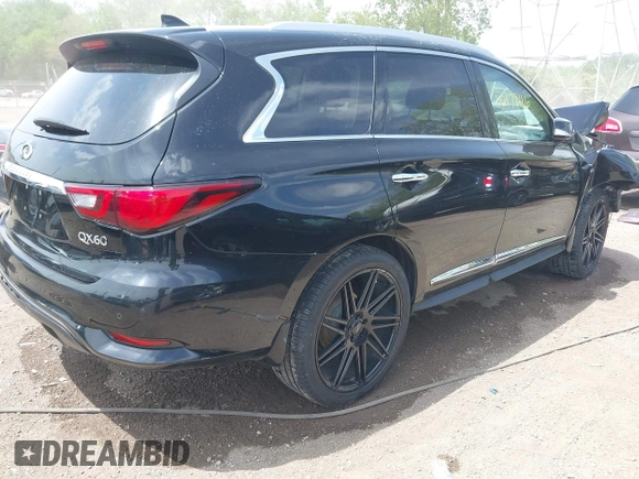 2019 Infiniti QX60 Luxe with VIN 5N1DL0MM3KC534242, listed as a IAAI auction lot 42178116 with 71,290 mi miles and . Bid and sale history available at DreamBid. Image 4.