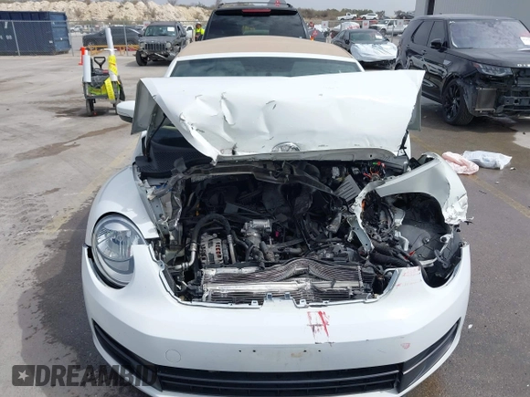 2015 Volkswagen Beetle 1.8T w/Tech with VIN 3VW517AT4FM812294, listed as a IAAI auction lot 41753967 with 59,857 mi miles and . Bid and sale history available at DreamBid. Image 12.