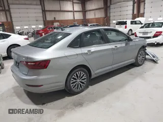 2021 Volkswagen Jetta S with VIN 3VWC57BU1MM052003, listed as a IAAI auction lot 41910900 with 31,263 mi miles and . Bid and sale history available at DreamBid. Image 4.