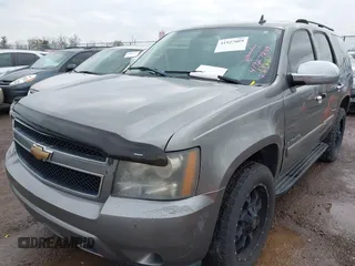 2007 Chevrolet Tahoe LT with VIN 1GNFC13077J278764, listed as a IAAI auction lot 41927809 with 211,943 mi miles and . Bid and sale history available at DreamBid. Image 2.