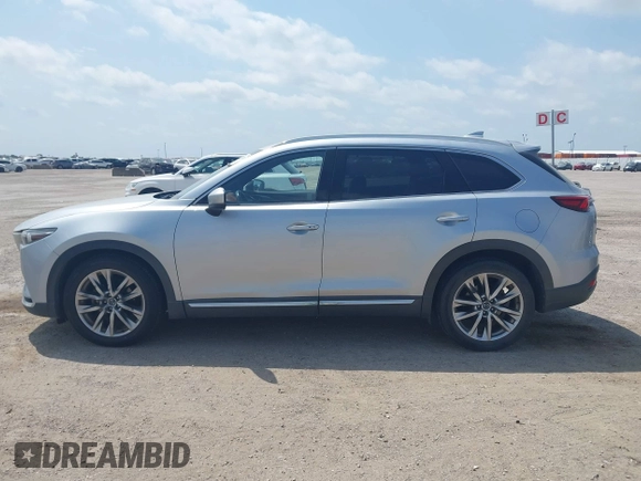 2016 Mazda CX-9 Signature with VIN JM3TCBEY9G0117785, listed as a IAAI auction lot 42331883 with 115,096 mi miles and . Bid and sale history available at DreamBid. Image 14.