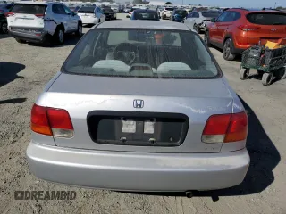 1998 Honda Civic LX with VIN 2HGEJ6670WH607791, listed as a Copart auction lot 72235594 with 205,571 mi miles and Salvage Title. Bid and sale history available at carsss.com. Image 6.