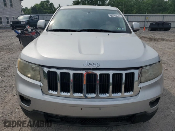 2011 Jeep Grand Cherokee Laredo with VIN 1J4RR4GG3BC581321, listed as a Copart auction lot 60893935 with 216,137 mi miles and Clean title. Bid and sale history available at DreamBid. Image 5.