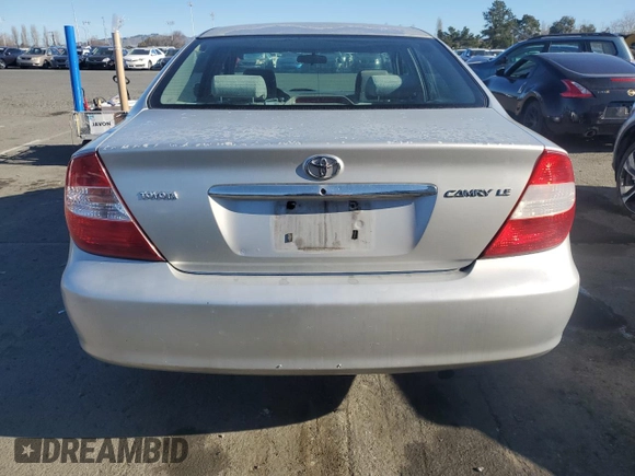 2004 Toyota Camry LE with VIN 4T1BE32K64U936757, listed as a Copart auction lot 88577665 with 232,354 mi miles and Salvage Title. Bid and sale history available at carsss.com. Image 6.