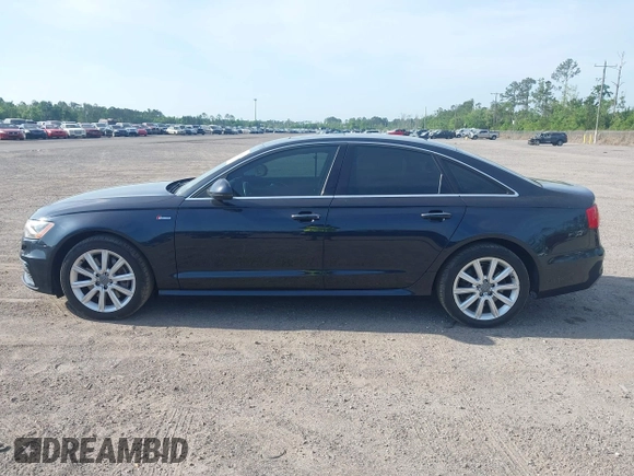 2015 Audi A6 3.0T Prestige with VIN WAUHGAFC3FN011654, listed as a IAAI auction lot 42104153 with 166,719 mi miles. Bid and sale history available at carsss.com. Image 14.