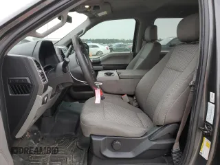 2020 Ford F-150 XL with VIN 1FTEW1CB1LKD56067, listed as a Copart auction lot 87887395 with 106,980 mi miles and Salvage Title. Bid and sale history available at carsss.com. Image 7.