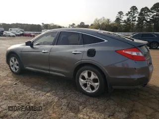 2010 Honda Crosstour EX-L z VIN 5J6TF1H52AL004515, wystawiony jako Copart lot #49208645 z przebiegiem 215 512 mil mil oraz Tytuł czysty. Historia ofert i sprzedaży dostępna na DreamBid. Obrazek 2.