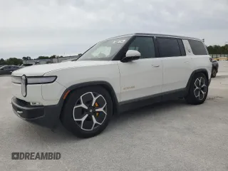 2023 Rivian R1S Adventure z VIN 7PDSGABA3PN024458, wystawiony jako Copart lot #74087714 z przebiegiem 3 505 mil mil oraz Nie do naprawy • Non repairable. Historia ofert i sprzedaży dostępna na DreamBid. Obrazek 1.