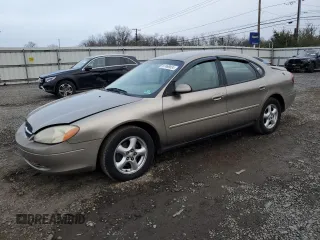 2003 Ford Taurus SE Standard z VIN 1FAHP53U03G243836, wystawiony jako Copart lot #44325825 z przebiegiem 128 403 mil mil oraz Szkoda całkowita • Salvage title. Historia ofert i sprzedaży dostępna na DreamBid. Obrazek 1.