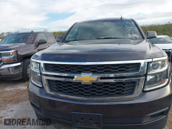2017 Chevrolet Tahoe LT with VIN 1GNSKBKC3HR206093, listed as a IAAI auction lot 40602629 with 161,740 mi miles and . Bid and sale history available at DreamBid. Image 12.