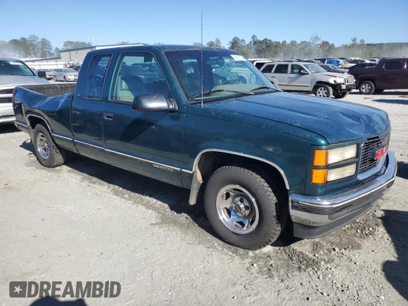 1996 GMC Sierra 1500 with VIN 2GTEC19W4T1542916, listed as a Copart auction lot 75097274 with 310,745 mi miles and Salvage Title. Bid and sale history available at DreamBid. Image 4.
