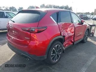 2023 Mazda CX-5 S Premium with VIN JM3KFBDM2P0130525, listed as a IAAI auction lot 41479518 with 18,145 mi miles and . Bid and sale history available at DreamBid. Image 4.