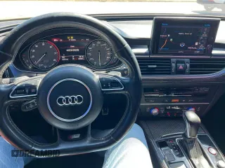 2018 Audi S6 Premium Plus z VIN WAUFFAFC6JN000859, wystawiony jako Copart lot #58193725 z przebiegiem 120 327 mil mil oraz Tytuł czysty. Historia ofert i sprzedaży dostępna na DreamBid. Obrazek 7.