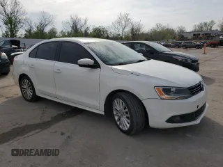 2013 Volkswagen Jetta TDI w/Premium/Nav with VIN 3VWLL7AJ4DM242682, listed as a Copart auction lot 53879635 with 123,945 mi miles and Salvage title. Bid and sale history available at DreamBid. Image 4.